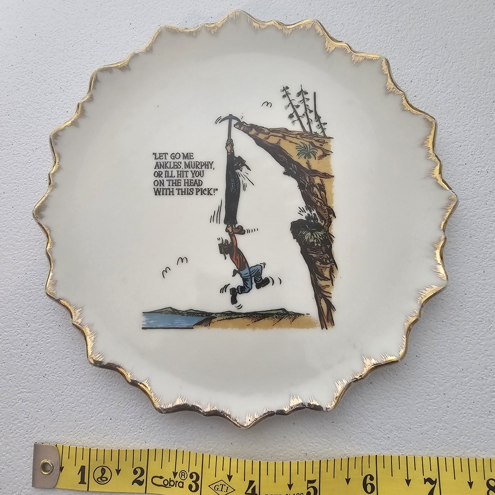 White and Gold Scalloped Decorative Plate with Cartoon Illustration